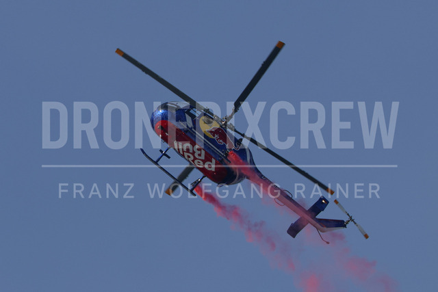 Audi FIS Ski World Cup: Men’s Slalom – Hahnenkamm Race, Kitzbuehel | Kitzbuehel, Austria, 25.Jan.26 - Alpine Skiing - FIS World Cup, Hahnenkamm Race, Slalom, men. The image shows red bull helicopter air show.