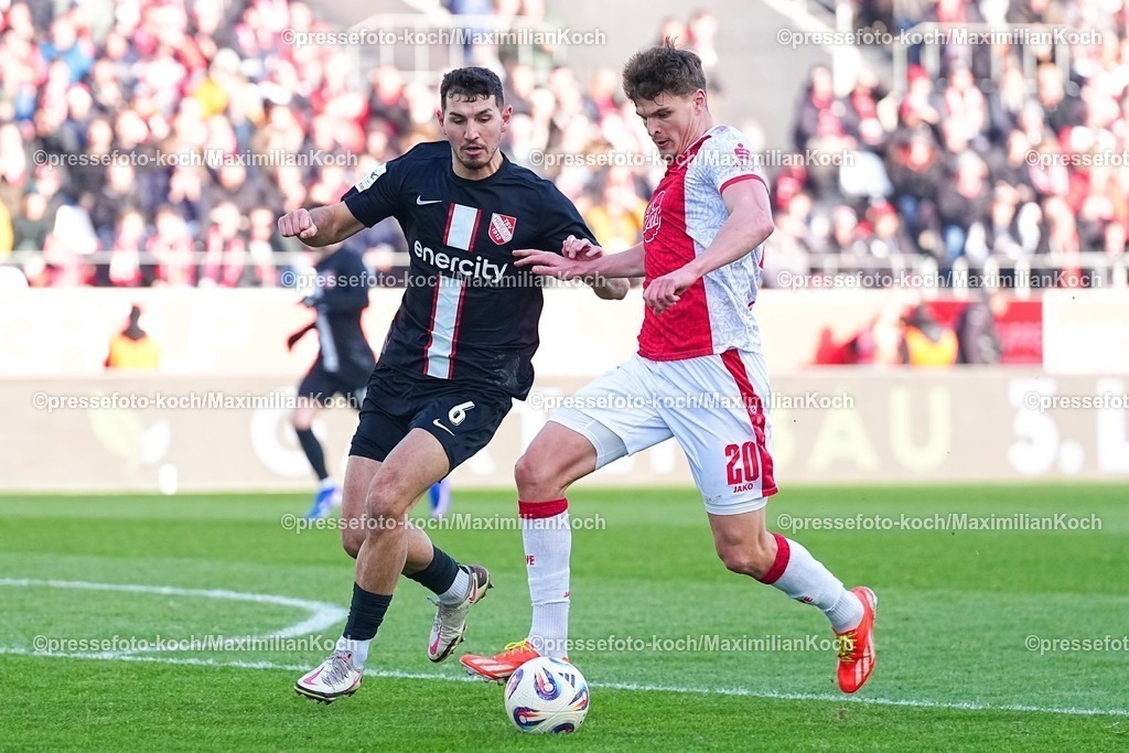 xYDRx24012601022 | 24.01.2026, xydrx, Fußball, 3.Liga, Rot-Weiss Essen - TSV Havelse, Saison 2025 2026, Stadion an der Hafenstraße: Semi Belkahia (TSV Havelse #6) im Zweikampf gegen Marek Janssen (Rot-Weiss Essen #20)    DFB regulations prohibit any use of photographs as image sequences and or quasi-video. Photo: xYannisxDreimannxPressefotoKochx