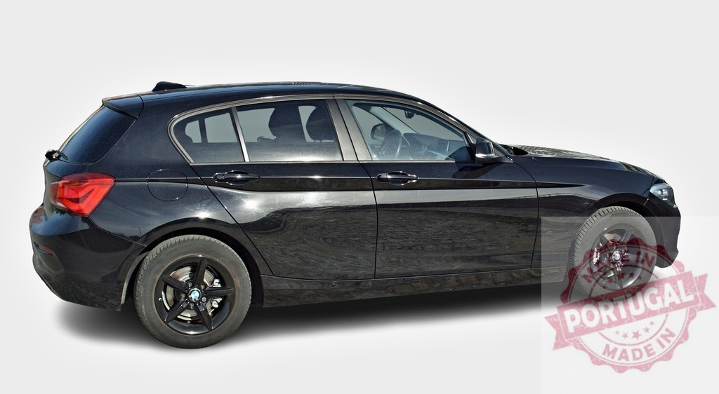 Shiny black BMW 1 series car parked on white background | Modern compact hatchback car parked on a bright seamless background - Realized with Pictrs.com