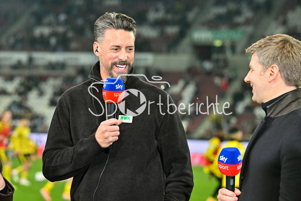 FC Augsburg - Borussia Dortmund | AUGSBURG, GERMANY - OCTOBER 31: Sandro WAGNER headcoach FC Augsburg, interview, sky, happy, before the bundesliga match between FC Augsburg vs. Borussia Dortmund on matchday 9 at WWK Arena on October 31, 2025 in Augsburg, Germany / DFL REGULATIONS PROHIBIT ANY USE OF PHOTOGRAPHS AS IMAGE SEQUENCES AND/OR QUASI-VIDEO