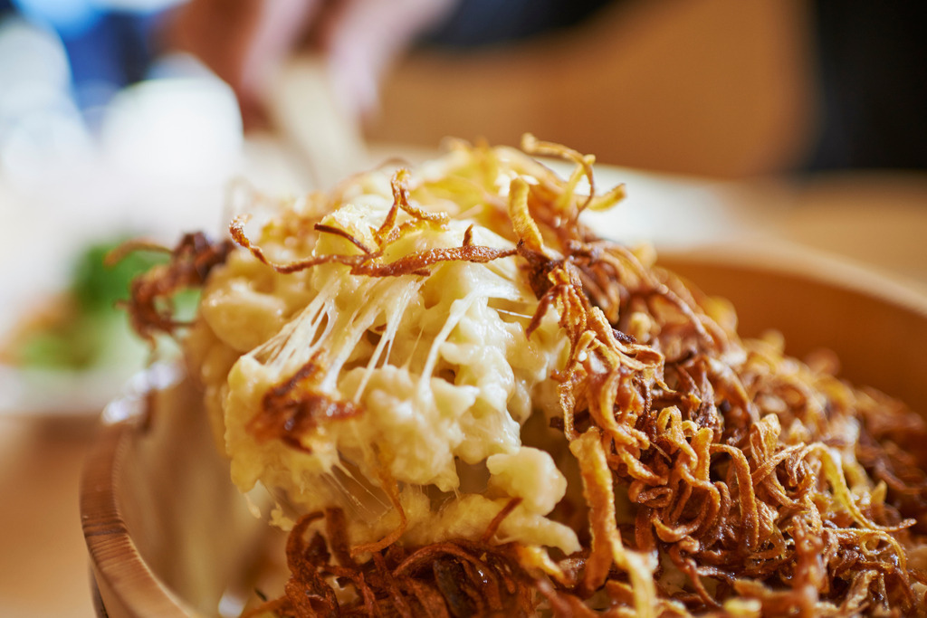 Kaesespaetzle | Schoenenbach, Austria - September 08, 2015: Kaesespaetzle mit Röstzwiebel im Holzbottich. - Realisiert mit Pictrs.com