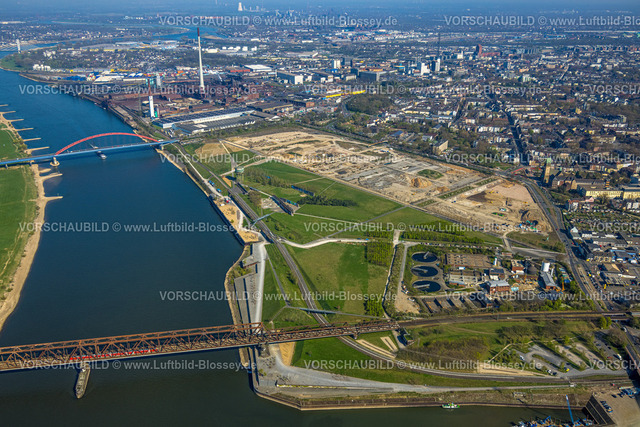 Duisburg250401913 | Luftbild, Rheinpark Duisburg am Fluss Rhein und geplante Wohnanlage RheinOrt Hochfeld, künftiges IGA-Gelände, historische Hochfelder Eisenbahnbrücke und Brücke der Solidarität mit rotem Geländer, Fernsicht, Hochfeld, Duisburg, Ruhrgebiet, Nordrhein-Westfalen, Deutschland