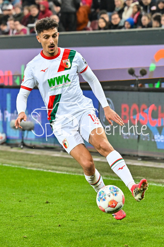 FC Augsburg - VfB Stuttgart | aUGSBURG, GERMANY - 22. MAERZ: am Ball Dimitrios GIANNOULIS (FC Augsburg 13)/ Einzelfoto / Freisteller während dem Bundesligamatch zwischen dem FC Augsburg und dem VfB Stuttgart am 27. Spieltag in der WWK Arena / DFL REGULATIONS PROHIBIT ANY USE OF PHOTOGRAPHS AS IMAGE SEQUENCES AND/OR QUASI-VIDEO