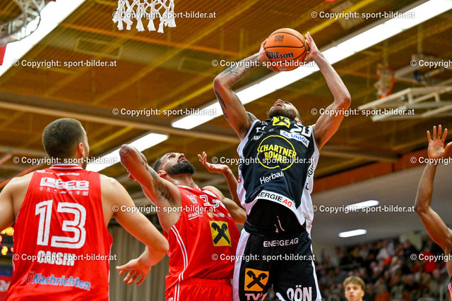 AUT, BSL, Flyers Wels vs Basket Swans Gmunden | 02.11.2024, Raiffeisen Arena Wels, AUT, BSL, Flyers Wels vs Basket Swans Gmunden, im Bild Radii Caisin of Raiffeisen Flyers Wels, Craig Osaikhwuwuomwan of Raiffeisen Flyers Wels, Joseph Reece of Basket Swans Gmunden// BSL, Basketball Super League Match between Flyers Wels and Gmunden Swans, Austria on 2024/11/02