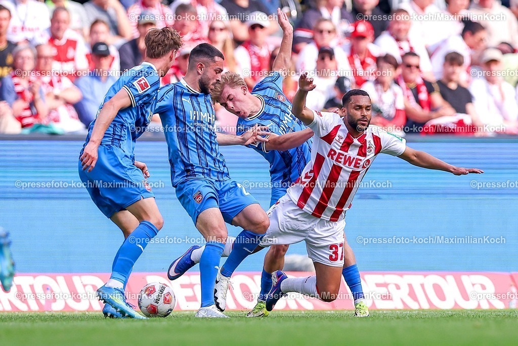 1FC10052601037 | 10.05.2026, Fußball, 1. FC Köln - 1. FC Heidenheim, 1. Fußball Bundesliga Herren, 33. Spieltag, RheinEnergie-STADION, Saison 2025 / 2026: Linton Maina&nbsp;(1FC Koeln #37) im Zweikampf gegen  Arijon Ibrahimovic&nbsp; (FC Heidenheim #22) Hennes Behrens&nbsp; (FC Heidenheim #26)  DFB regulations prohibit any use of photographs as image sequences and or quasi-video.