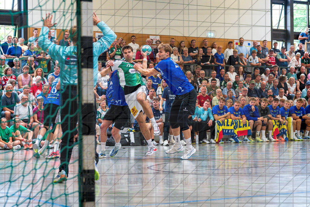 IHC 2026 - TSV Hannover-Burgdorf vs. Mors-Thy Håndbold | Simon Gade (TSV Hannover-Burgdorf #16), Lasse Mathias Pedersen (Mors-Thy Håndbold #2); IHC 2026 - TSV Hannover-Burgdorf vs. Mors-Thy Håndbold am 07.08.26 in Sporthalle KGS, Schneverdingen - Realisiert mit Pictrs.com