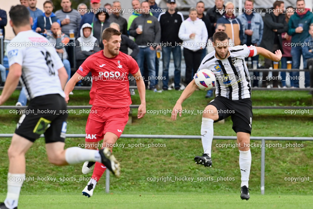 SVG Bleiburg vs. SAK 23.9.2023 | #22 Leo Ejup SAK, #9 Adnan Besic (K) SVG Bleiburg, SVG Bleiburg vs. SAK 23.9.2023, SVG Bleiburg vs. SAK am 23.09.2023 in Bleiburg (Karl Kornberger Stadion), Austria, (Photo by Bernd Stefan)