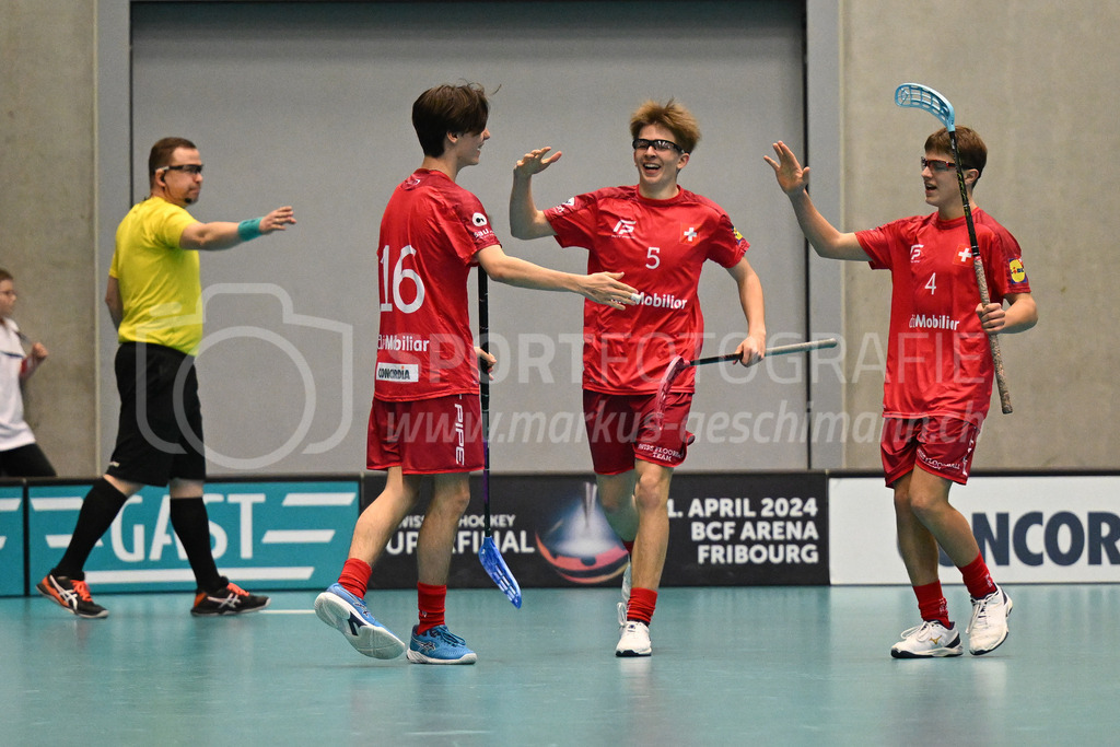 Switzerland B U19 vs Switzerland U19 - 4. February 2024 | Switzerland B U19 vs Switzerland U19
U19 Men International Matches in Switzerland
GoEasy Arena, Siggenthal Station
Switzerland forward #16 Dario Bürgler scores and celebrates with forward #5 Severin Schmid and forward #4 Sebastian Mathis.
Credit: Markus Aeschimann | <a href="https://www.markus-aeschimann.ch">Sportfotografie Markus Aeschimann</a> | <a href="https://www.instagram.com/sportfotografie.aeschimann">@sportfotografie.aeschimann</a> - Realisiert mit Pictrs.com