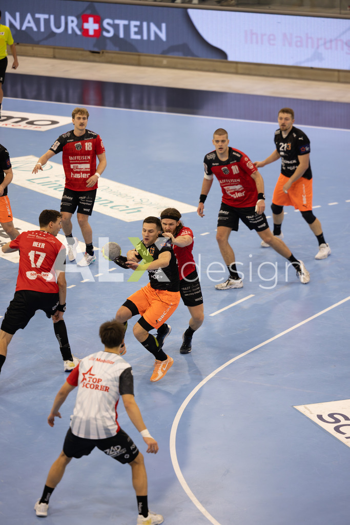 Handballen I Herren I Saison 2025-2026 I Quickline Handball League 2026 | Men I 18. Spieltag I Pfade Winterthur - Kadetten Schaffhausen I 20.12.2025 | Hochwertige Sportfotos kaufen & lizenzieren für Medien, Vereine, Agenturen & Sportler:innen. Entdecke professionelle Sportfotografie im Bildshop von Alexander Franzen. - Realisiert mit Pictrs.com