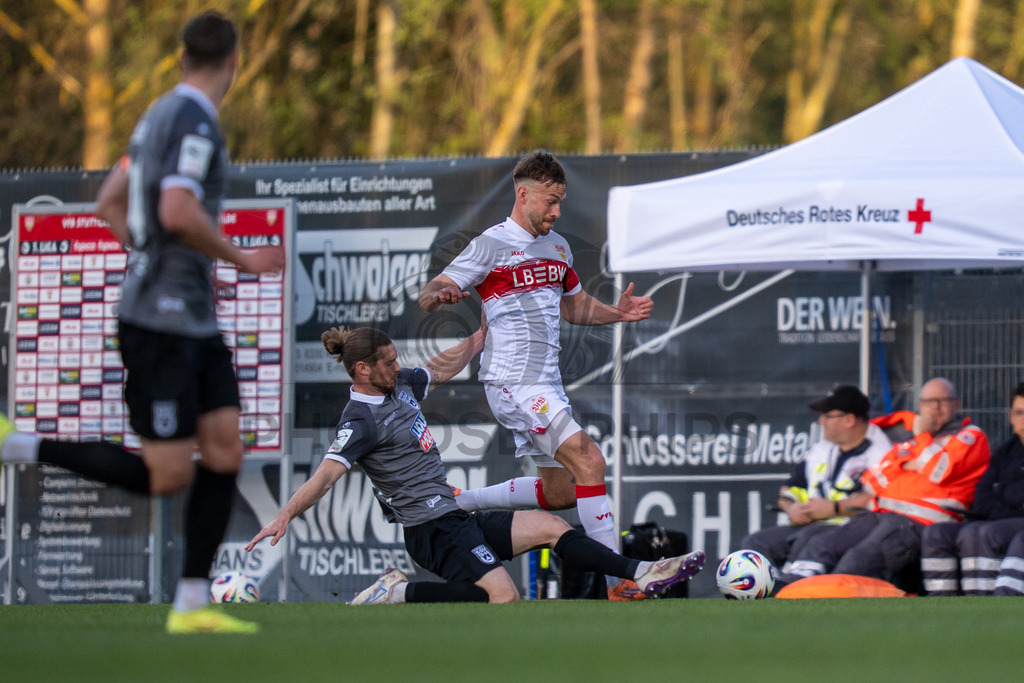 VfB Stuttgart II vs. SSV Ulm 1846 Fussball, Fussball, 3. Liga, 32. Spieltag, 08.04.2026 | Zweikampf zwischen Dennis Chessa (SSV Ulm 1846 Fussball, #11) und Dominik Nothnagel (VfB Stuttgart II, #29),VfB Stuttgart II vs. SSV Ulm 1846 Fussball, Fussball, 3. Liga, 32. Spieltag, 08.04.2026DFB regulations prohibit any use of photographs as image sequences and/or quasi-video