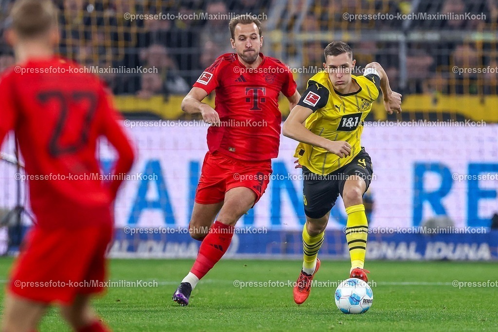 BVB30112401025 | 30.11.2024, Borussia Dortmund - FC Bayern München, 1. Fußball Bundesliga, 12. Spieltag, Signal Iduna Park, Saison 2024 2025: Harry Kane (Bayern #9) gegen Nico Schlotterbeck (BVB #4) ZweikampfDFB regulations prohibit any use of photographs as image sequences and or quasi-video.