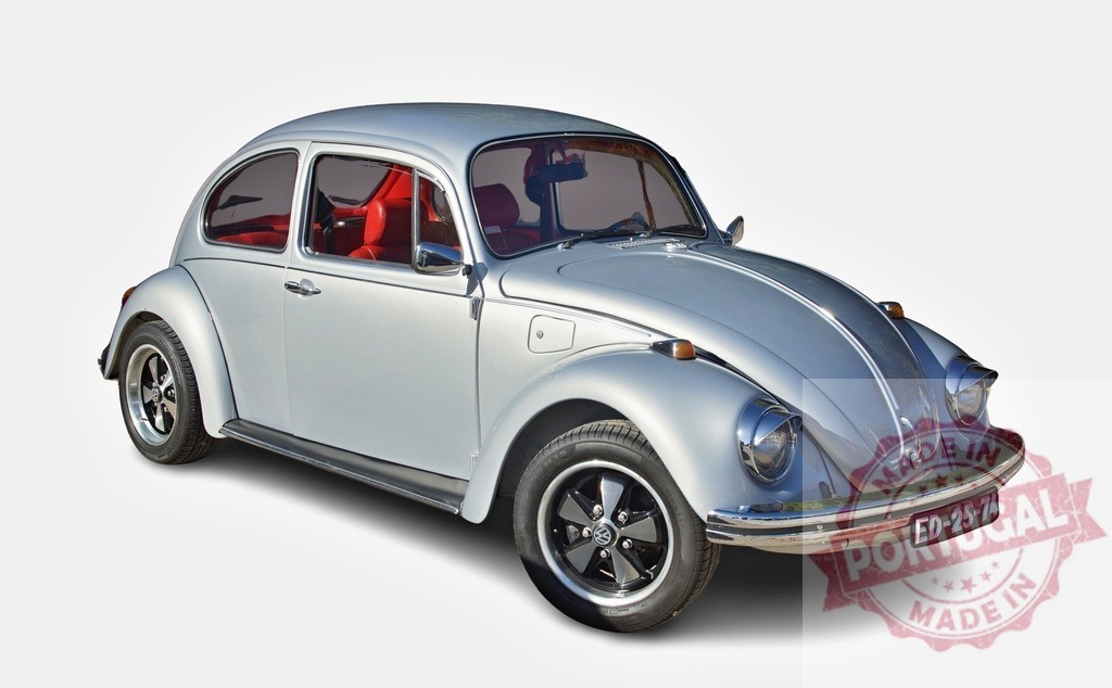 Volkswagen Beetle classic car showing silver exterior and red interior | Volkswagen Beetle classic car isolated on a white background with a silver body and red seats - Realized with Pictrs.com