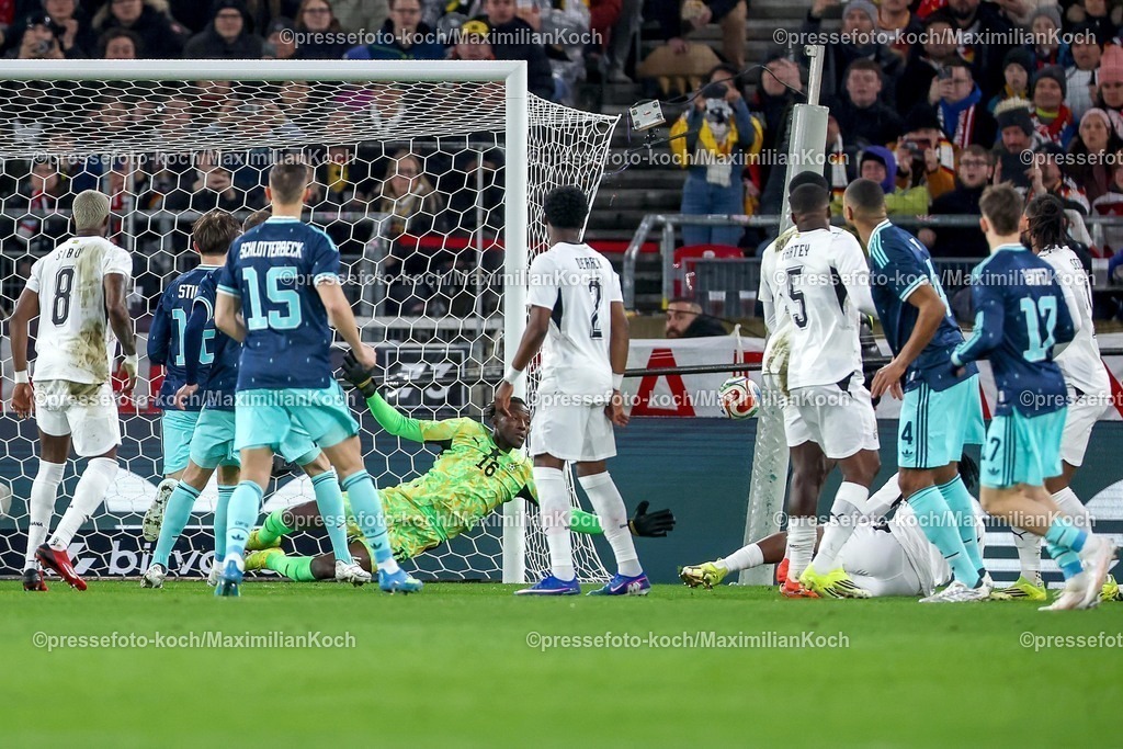DFB30032600032 | 30.03.2026, Fußball, Länderspiel, Deutschland - Ghana, MHP-Arena (Stuttgart), Saison 2025 2026: Benjamin Asare (Ghana #16) verteidigt gegen Florian Wirtz (GER #17) Freistoß  DFB regulations prohibit any use of photographs as image sequences and or quasi-video.