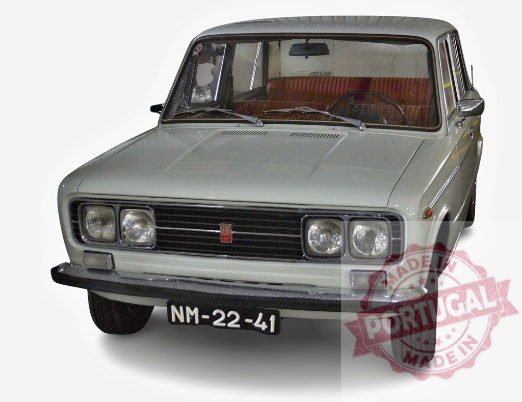 White vintage Fiat 124 sedan on white background | White classic Fiat 124 car showing its front grille, headlights, and license plate - Realized with Pictrs.com