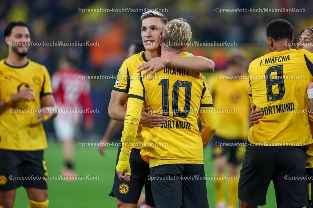 UCL01102501136 | 01.10.2025, Fußball, UEFA Champions League, Borussia Dortmund - Athletic Club Bilbao, BVB Stadion, 2. Spieltag, Saison 2025 2026: Torjubel nach dem Tor zum 4:1 durch Torschütze Julian Brandt (BVB #10)  zusammen mit  Nico Schlotterbeck (BVB #04) Regulations prohibit any use of photographs as image sequences and or quasi-video.