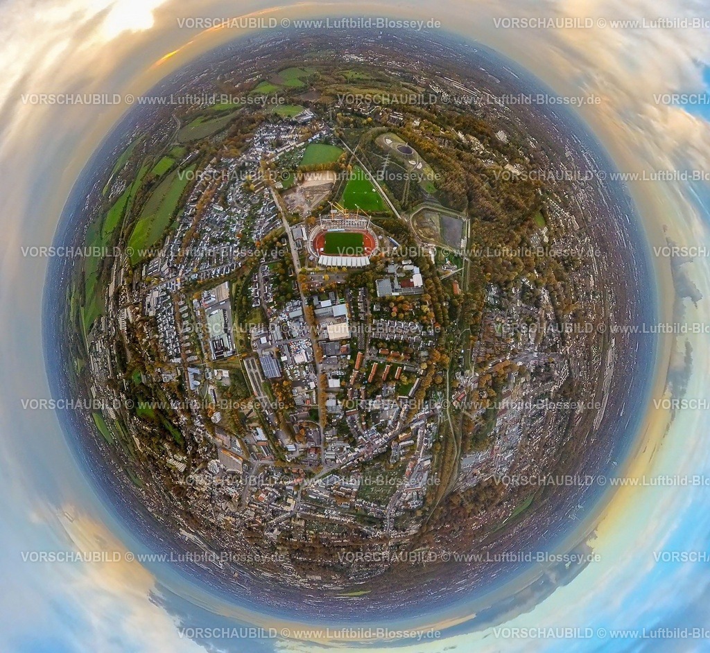 Bochum231190094WattenscheidLohrheideStadion-topaz | Luftbild, Lohrheidestadion Fußballplatz und Leichtathletikstadion der SG Wattenscheid 09, Baustelle mit Neubau Westtribüne und Baustelle mit Umbau Regenrückhaltebecken Wattenscheider Bach, Olympiastützpunkt NRW Westfalen Bochum, RW Rot-Weiß Leithe Fußballverein Baustelle für Renovierung und Neugestaltung der Sportplätze, Wohngebiet und Gewerbegebiet Lohrheidestraße mit Baumallee in leuchtenden Herbstfarben, BergeHalde Rheinelbe Sehenswürdigkeit, Erdkugel, Fisheye Aufnahme, Fischaugen Aufnahme, 360 Grad Aufnahme, tiny world, little planet, fisheye Bild, Leithe, Bochum, Ruhrgebiet, Nordrhein-Westfalen, Deutschland