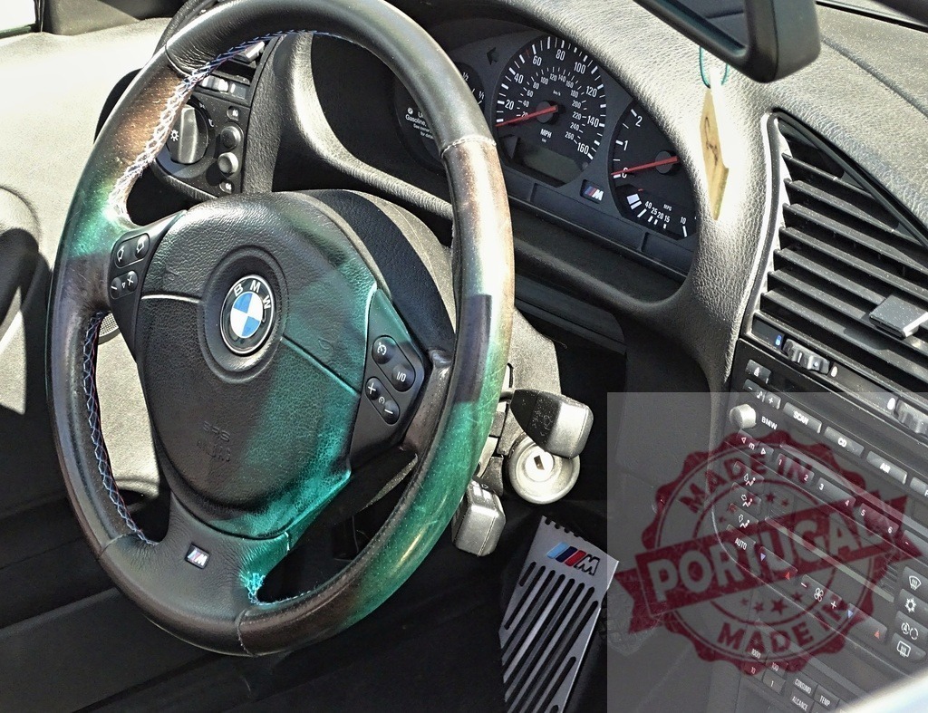 BMW M series steering wheel and interior dashboard | BMW M series car interior showing steering wheel, dashboard, and pedals - Realized with Pictrs.com