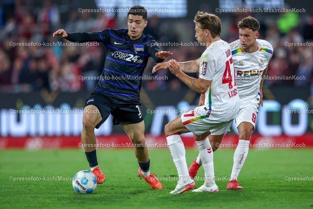 1FC05042501048 | 05.04.2025, Fußball, 1. FC Köln - Hertha BSC, 2.. Fußball Bundesliga, 28. Spieltag, RheinEnergie-STADION, Saison 2024 2025: Ibrahim Maza (Hertha BSC #10) im Zweikampf gegen Mathias Olesen (FC Koeln #47) und Luca Waldschmidt (FC Koeln #9) DFB regulations prohibit any use of photographs as image sequences and or quasi-video.