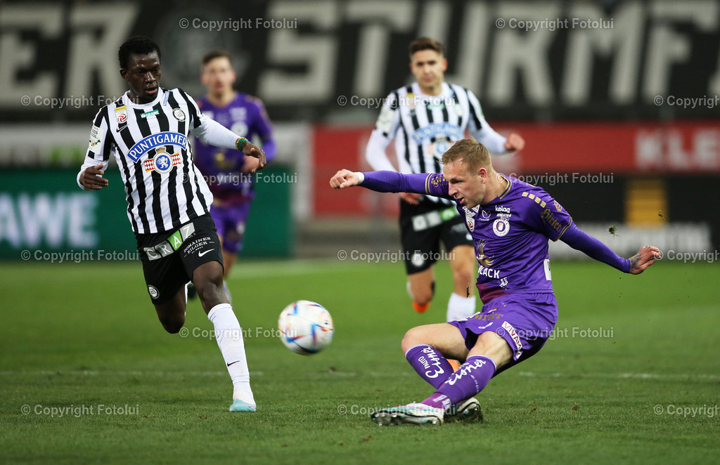 A_LUI_25032023___1 | SPORT,FUSSBALL,ADMIRAL BUNDESLIGA STURM GRAZ-AUSTRIA KLAGENFURT 25.02.2023IM BILD: AMADOU DANTE (GRAZ) UND FLORIAN JARITZ (KLAGENFURT) FOTOLUI/MARIO WIMMER