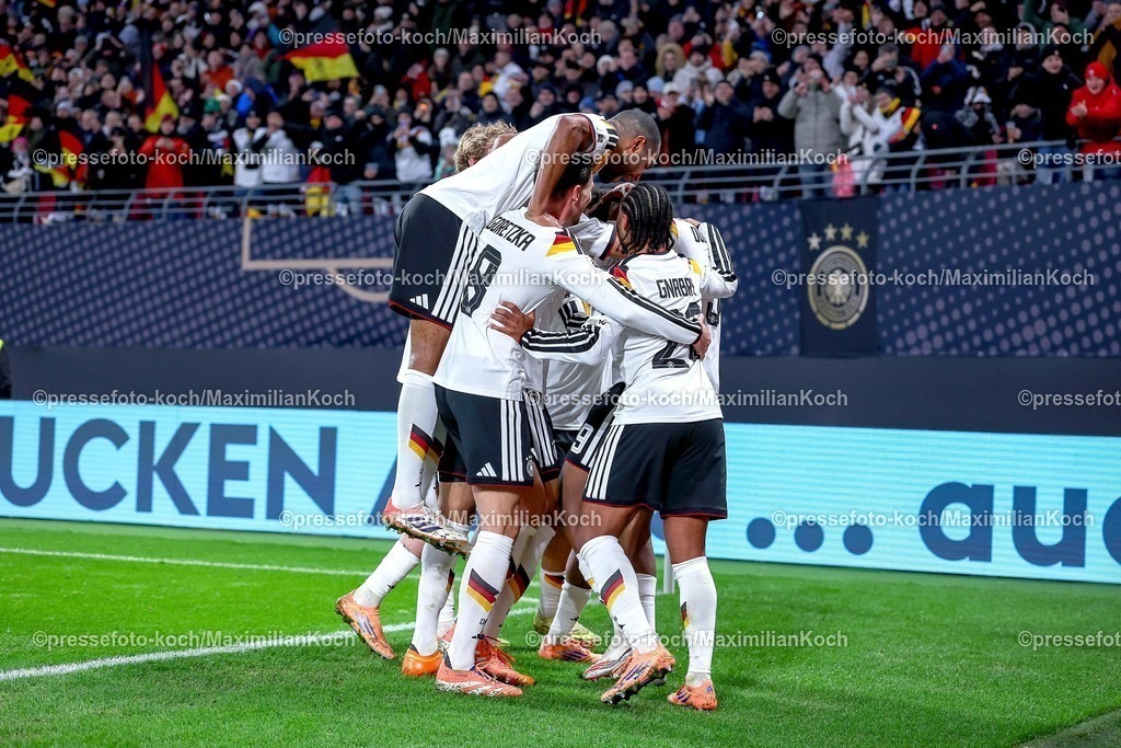 DFB17112503088 | 17.11.2025, Fußball, Länderspiel, WM-Qualifikation Europa, Deutschland - Slowakei, Red Bull Arena (Leipzig), 10. Spieltag, Saison 2025 2026: Torjubel nach dem Tor zum 6:0 durch Torschütze Forzan Assan Ouedraogo (GER #09)  zusammen mit  Jonathan Tah (GER #04) Leon Goretzka (GER #08) Nick Woltemade (GER #11) Serge Gnabry (GER #20)  Regulations prohibit any use of photographs as image sequences and or quasi-video.