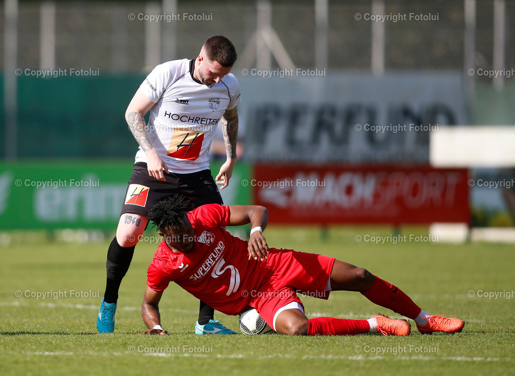A_LUI_290423_41 | SPORT,FUSSBALL,LL:OST ASKOE OEDT 1B-SU VORTUNA BAD LEONFELDEN 29.04.2023 IM BILD: EMMANUEL CHINSONO EZIEKWE (OEDT 1B) UND MARCEL SCHENK (LEONFELDEN)FOTO:FOTOLUI