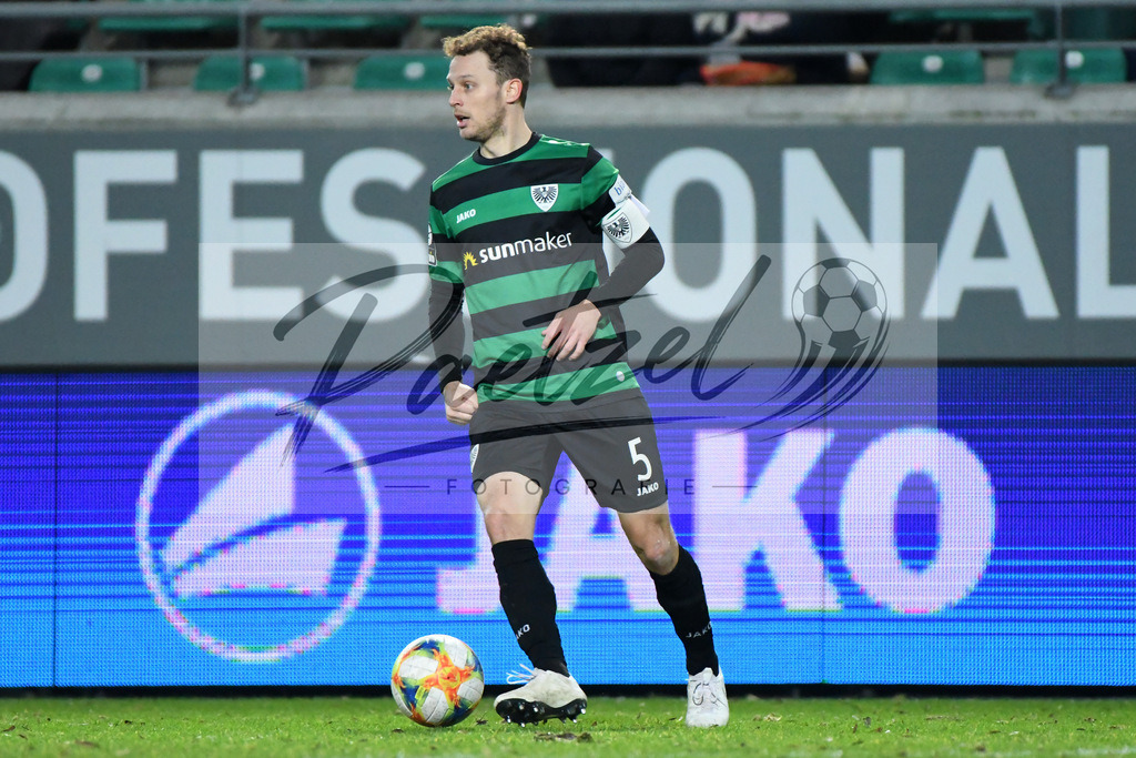 20200214_SCPFWK_0069 | Fussball, Herren: Julian Schauerte (SC Preussen Muenster) in Aktion, am Ball, Einzelaktion waehrend des Spiels der 3. Liga zwischen SC Preussen Muenster und FC Wuerzburger Kickers im Preussenstadion am 14.02.2020 in Muenster, Deutschland.DFB / DFL REGULATIONS PROHIBIT ANY USE OF PHOTOGRAPHS AS IMAGE SEQUENCES AND/OR QUASI-VIDEO. - Realisiert mit Pictrs.com