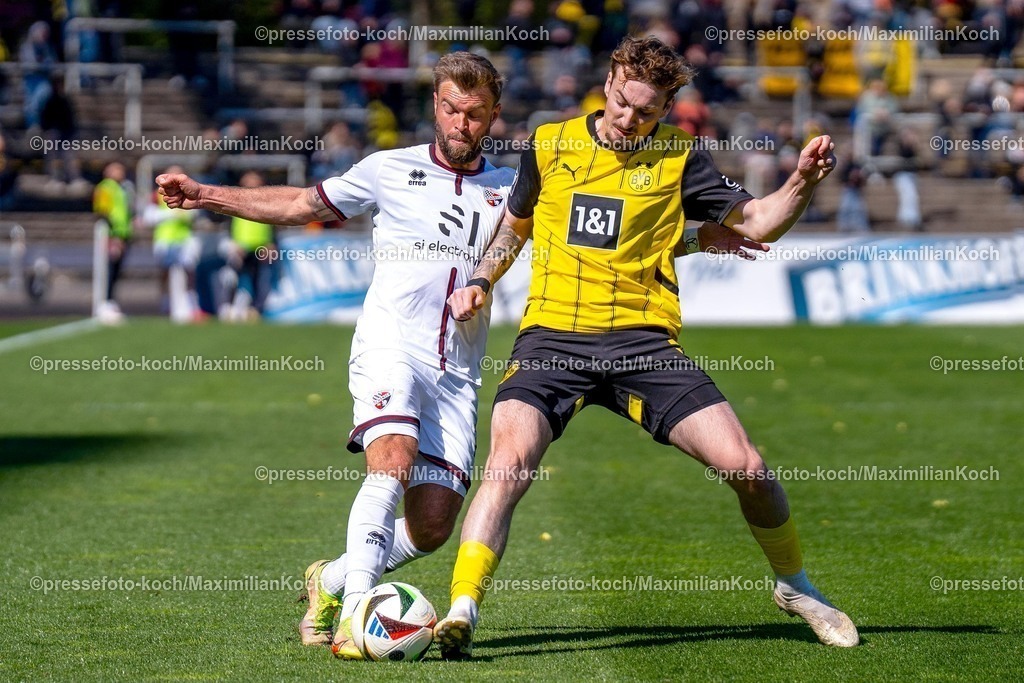 xydr06042501043 | 06.04.2025, xydrx, Fußball, Borussia Dortmund II - FC Ingolstadt 04, 3.Liga, Stadion Rote Erde, Saison 2024 2025: Yannick Deichmann (FC Ingolstadt #20) im Zweikampf gegen Tony Reitz (Borussia Dortmund II #36)  DFB regulations prohibit any use of photographs as image sequences and or quasi-video.