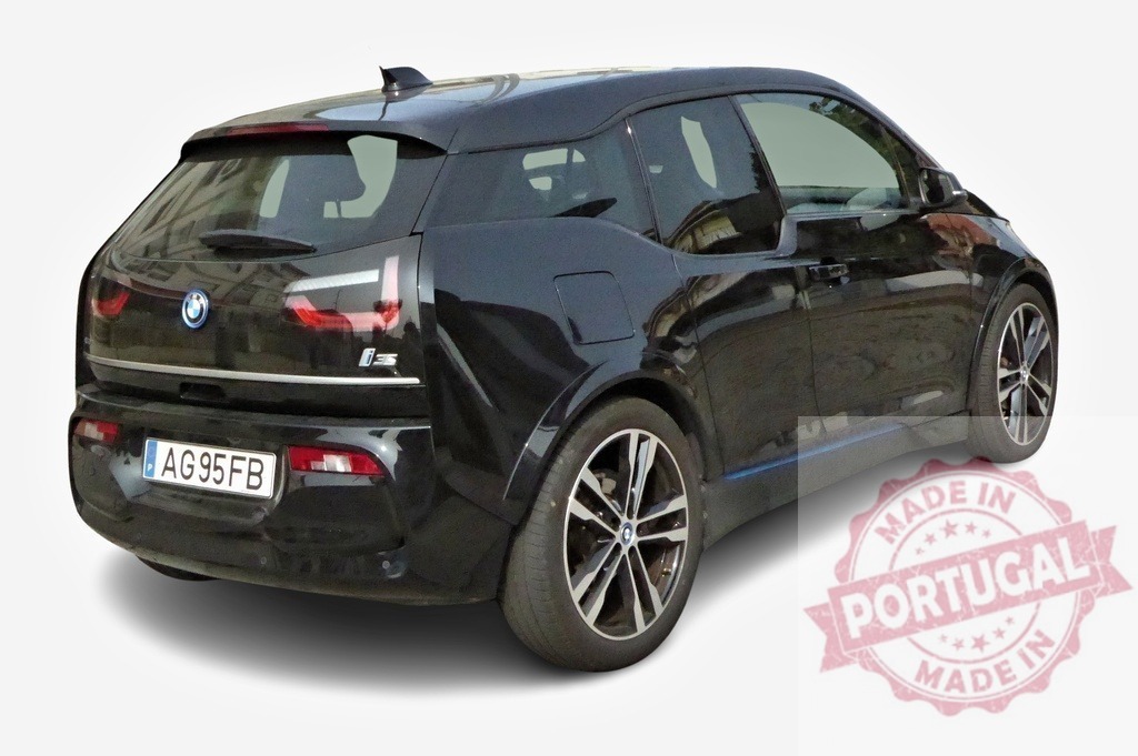 Black BMW i3s electric car parked on white background | Rear view of a modern black BMW i3s electric car parked on a white background, showcasing its sleek design - Realized with Pictrs.com