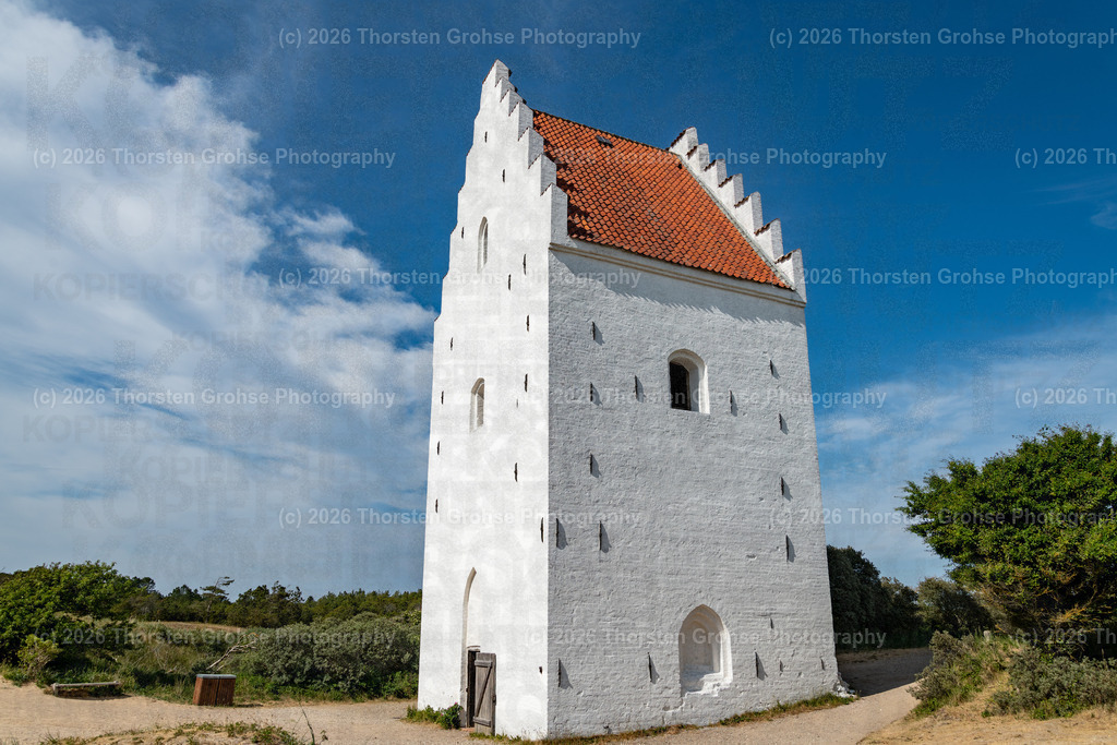 Sanded Church (den tilsandede kirke) Skagen North Jutland, Denmark, 2023, Versandete Kirche (den tilsandede kirke) Skagen Nordjütland, Dänemark, 2023 | The sanded church of St. Laurentius (Danish: den tilsandede kirke) is a popular attraction southwest of Skagen in North Jutland. Die verssandete Kirche St. Laurentius (dänisch: den tilsandede kirke) ist eine beliebte Sehenswürdigkeit südwestlich von Skagen in Nordjütland. - Realisiert mit Pictrs.com