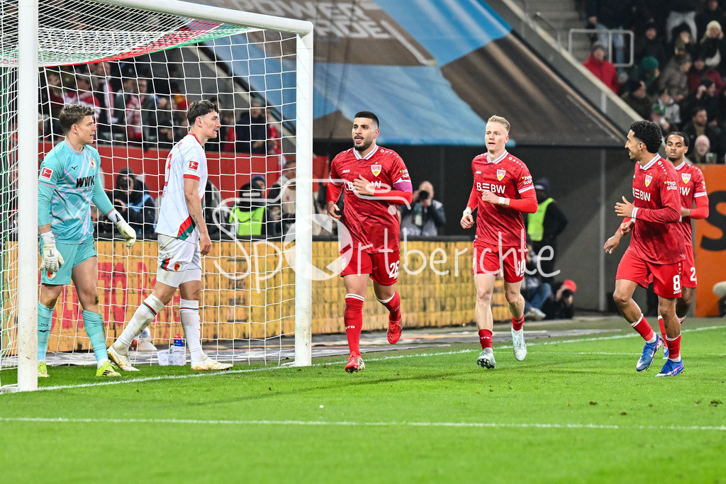 FC Augsburg - VfB Stuttgart | AUGSBURG, GERMANY - 22. MAERZ: Jubel der Gäste nach dem Treffer zum 1-4 durch Deniz UNDAV (VfB Stuttgart 26) / Tor / Torschuetze / Freude / Happy während dem Bundesligamatch zwischen dem FC Augsburg und dem VfB Stuttgart am 27. Spieltag in der WWK Arena / DFL REGULATIONS PROHIBIT ANY USE OF PHOTOGRAPHS AS IMAGE SEQUENCES AND/OR QUASI-VIDEO