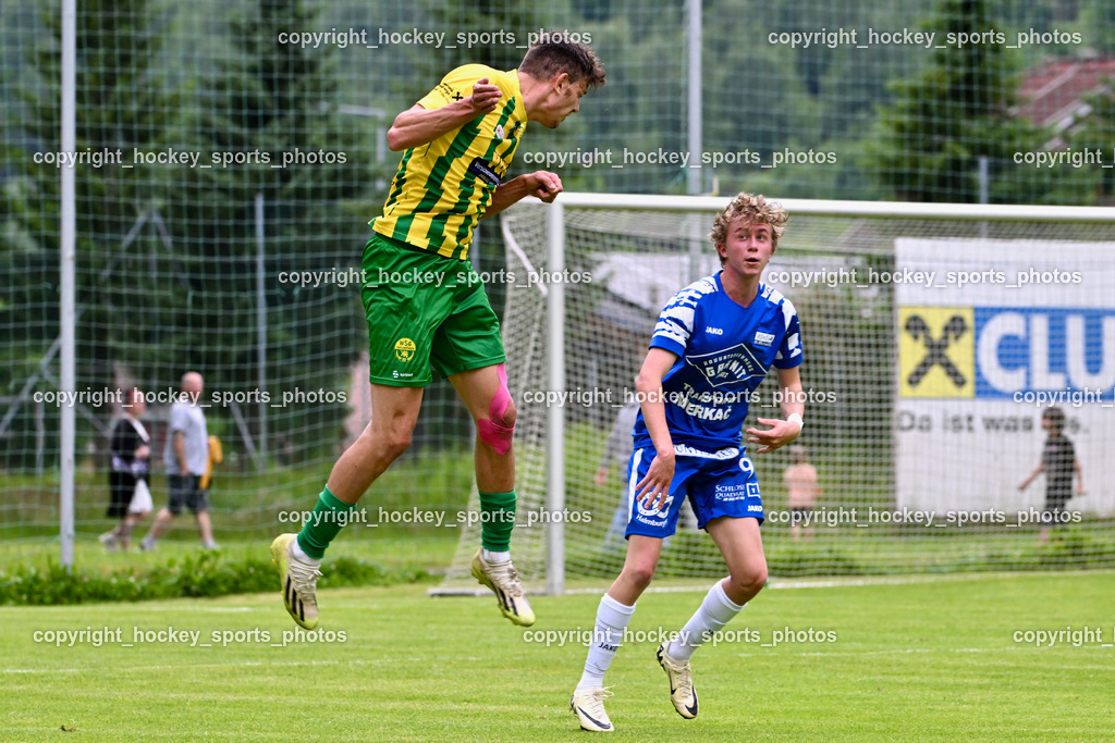 WSG Radenthein vs. St. Michael ob Bleiburg | #20 Mario Patrick Tarmann WSG Radenthein, #9 Daniel Andreas Milac St. Michael ob Bleiburg, WSG Radenthein vs. St. Michael ob Bleiburg, WSG Radenthein vs. St. Michael ob Bleiburg  am 15.06.2024 in Radenthein (Sportplatz Radenthein), Austria, (Photo by Bernd Stefan)