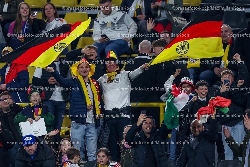 DFB23032502110 | 23.03.2025, Fußball, Viertelfinale UEFA Nations League, Deutschland - Italien, Signal Iduna Park, Saison 2024 2025: Fans schwenken Fahnen auf er TribüneDFB regulations prohibit any use of photographs as image sequences and or quasi-video.
