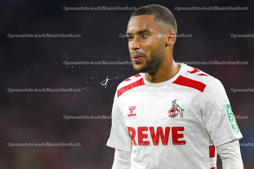 Koe14092402122 | 14.09.2024, 2. Fußball Bundesliga, 1. FC Köln - 1. FC Magdeburg, RheinEnergieSTADION, Saison 2024 2025: Linton Maina (1.FC Köln #37) spuckt Spucke aus dem MundDFB regulations prohibit any use of photographs as image sequences and or quasi-video.