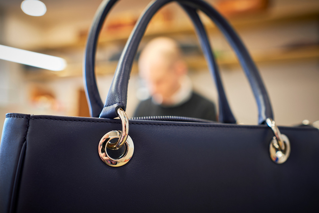 Albert Pattermann Wien | WIen, Austria - February 28, 2020; Albert Pattermann Wien; Blick durch eine blaue Tasche auf Herr Rippka. - Realisiert mit Pictrs.com