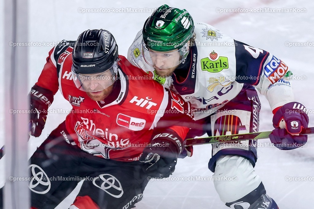 KEC20042601005 | 20.04.2026, Eishockey, DEL Halbfinale Play-Offs, Kölner Haie - Eisbären Berlin, Spiel 6, Lanxess-Arena Köln: Frederik Storm (Kölner Haie #19) im Zweikampf gegen  Adam Smith (Eisbären Berlin #04) 