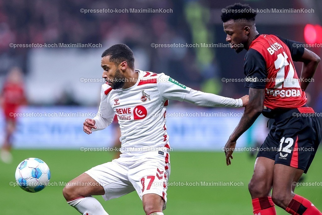DFB05022501067 | 05.02.2025, Fußball, DFB-Pokal Viertelfinale, Bayer 04 Leverkusen - 1.FC Köln, BayArena, Saison 2024 2025: Linton Maina (FC Köln #37) im Zweikampf gegen Edmond Tapsoba (Bayer04 Leverkusen #12)DFB regulations prohibit any use of photographs as image sequences and or quasi-video.
