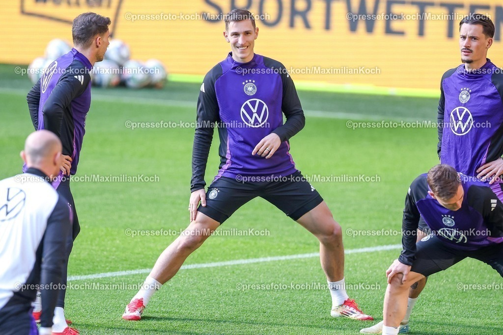 DFB22032502044 | 22.03.2025, Fußball, Abschlusstraining und Pressekonferenz vor dem Nations League  Viertelfinale Deutschland - Italien, Signal Iduna Park, Saison 2024 2025: Nico Schlotterbeck (GER #15) DFB regulations prohibit any use of photographs as image sequences and or quasi-video.