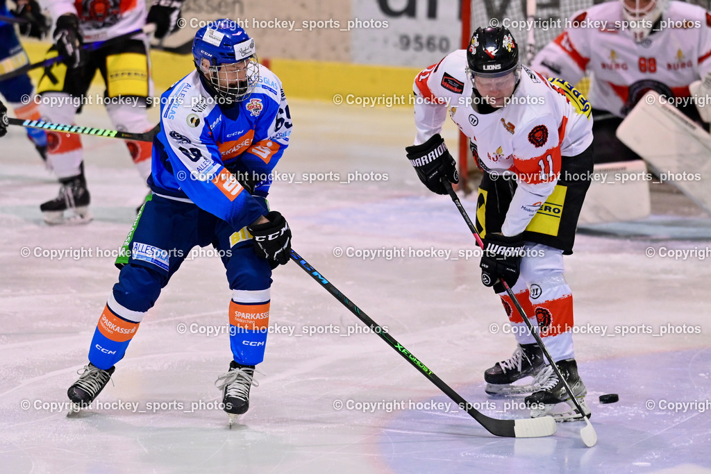 ESC SPARKASSE STEINDORF vs. EV ZELTWEG MURTAL LIONS | #69 Kreuzer Philipp ESC Steindorf, #11 Kuntze Marco EV ZELTWEG MURTAL LIONS, ESC SPARKASSE STEINDORF vs. EV ZELTWEG MURTAL LIONS, ESC SPARKASSE STEINDORF vs. EV ZELTWEG MURTAL LIONS am 27.12.2025 in Steindorf (Ossiachersee Halle), Austria, (Photo by Bernd Stefan)