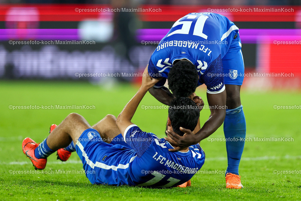 Koe14092401054 | 14.09.2024, 2. Fußball Bundesliga, 1. FC Köln - 1. FC Magdeburg, RheinEnergieSTADION, Saison 2024 2025: Mohammed El Hankouri (1.FC Magdeburg #11) und Daniel Heber (1.FC Magdeburg #15) freuen sich nach dem 2:1 SiegDFB regulations prohibit any use of photographs as image sequences and or quasi-video.