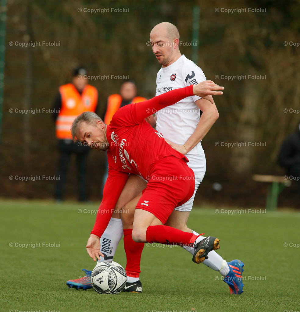 A_LUI_25022023_25 | SPORT,FUSSBALL,LL.OST ASKOE OEDT 1B-ST.AMGDALENA 25.02.2023IM BILD: DEXTER GLORYL  (OEDT1B) UND FLORIAN KRENNMAYR (ST.MAGDALENA) FOTO:FOTOLUI