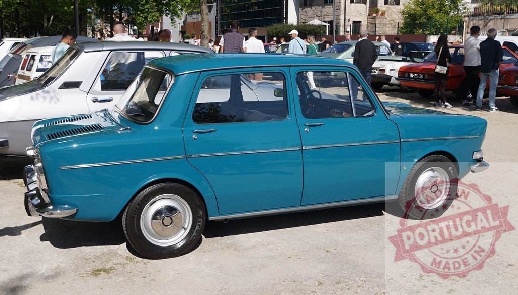 Teal Simca 1000 vintage classic car show | Teal Simca 1000 sedan showcasing vintage automobile design at an outdoor event - Realized with Pictrs.com