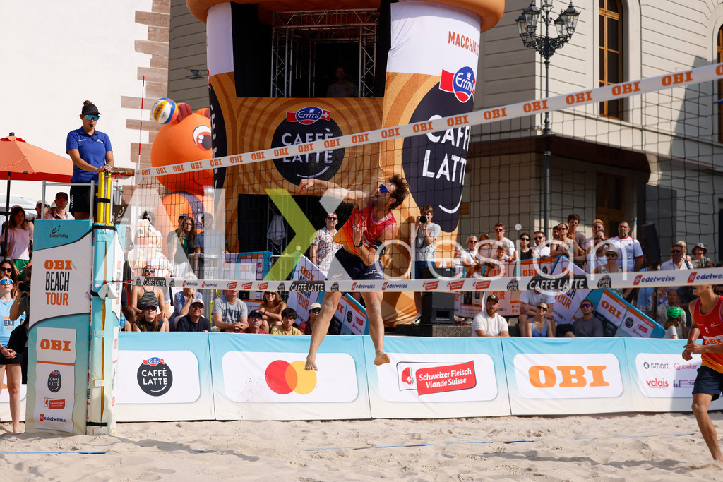 Obi BeachTour 2026 - Basel | BASEL, SWITZERLAND - JULY 19: LEO DILLIER (SUI) attack / spike during the Obi BeachTour 2026 match between DILLIER / FLÜCKIGER (SUI) and BREER / KÄLIN (SUI) at Barfüsserplatz on July 19, 2026 in Basel, Switzerland. - Realisiert mit Pictrs.com