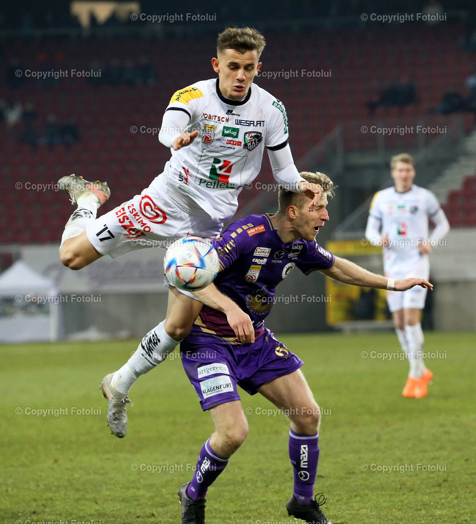 A_LUI_18022023_09 | SPORT,FUSSBALL,ADMIRAL BUNDESLIGA AUSTRIA KLAGENFURT-WOLFSBERGER AC 18.02.2023IM BILD. CHRISTOPHER BRIAN (KLAGENFURT) UND ERVIN OMIC (WOLFSBERG) FOTO.FOTOLUI/MARIO WIMMER