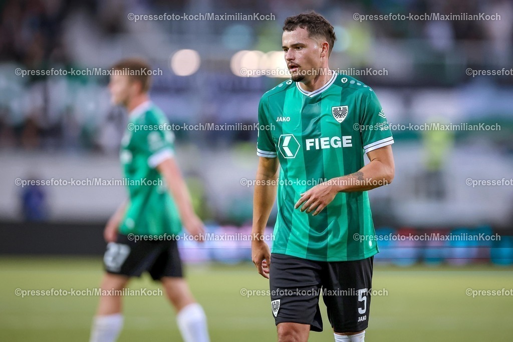 PRM22082501138 | 22.08.2025, Fußball, Preußen Münster - 1. FC Nürnberg, 2. Fußball Bundesliga,  Preußenstadion, Saison 2025 2026: Yassine Bouchama (Preussen Muenster #05)  DFB regulations prohibit any use of photographs as image sequences and or quasi-video.