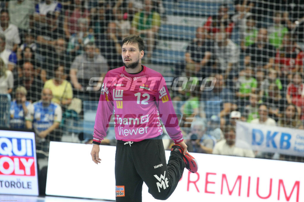 VFL Gummersbach -  FrischAuf Göppingen | Danierl Rebmann (lila Trikot)  - © Sportfoto-Sale (MK) - Realisiert mit Pictrs.com