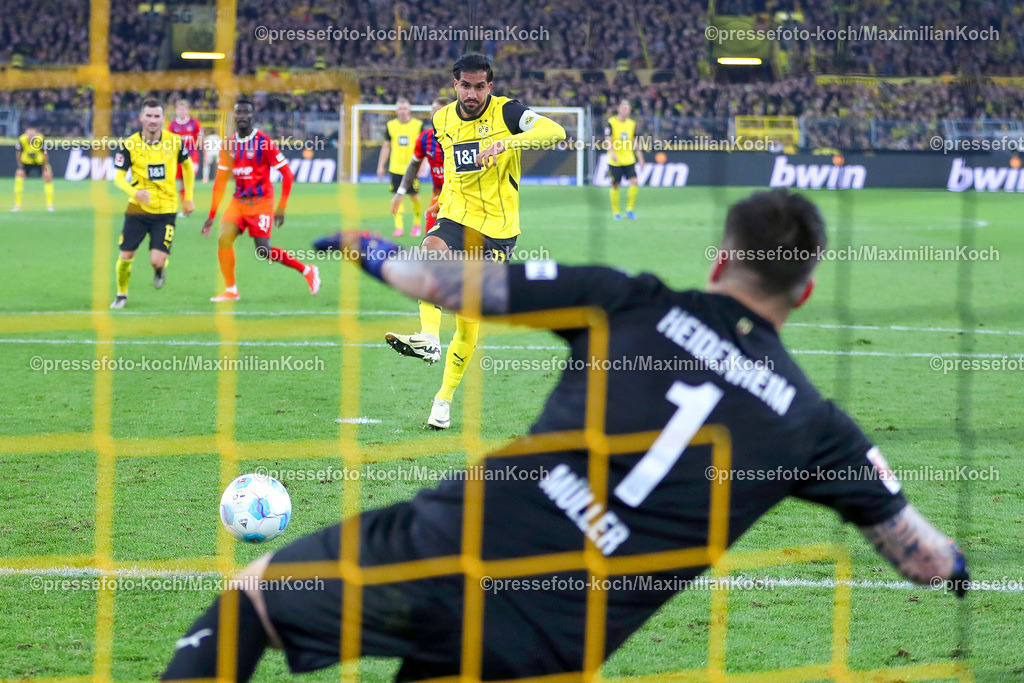 BVB13092401077 | 13.09.2024, 1. Fußball Bundesliga, Borussia Dortmund - 1. FC Heidenheim 1846, Signal Iduna Park, Saison 2024 2025: Torschuss Torjubel Elfmeter Elfemeterschießen Emre Can (BVB #23) verwandelt den Schuss auf das Tor von Torwart Kevin Müller (Heidenheim #1) zum 4:1DFB regulations prohibit any use of photographs as image sequences and or quasi-video.
