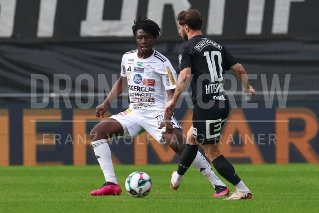 SK Puntigamer Sturm Graz vs TSV Egger Glas Hartberg – Championship Group    | Graz, Austria, 12.Apr.26 - SOCCER - ADMIRAL Bundesliga, SK Puntigamer Sturm Graz vs TSV Egger Glas Hartberg. The image shows Habib Anas Coulibaly (Hartberg) and Otar Kiteishvili (STU).    