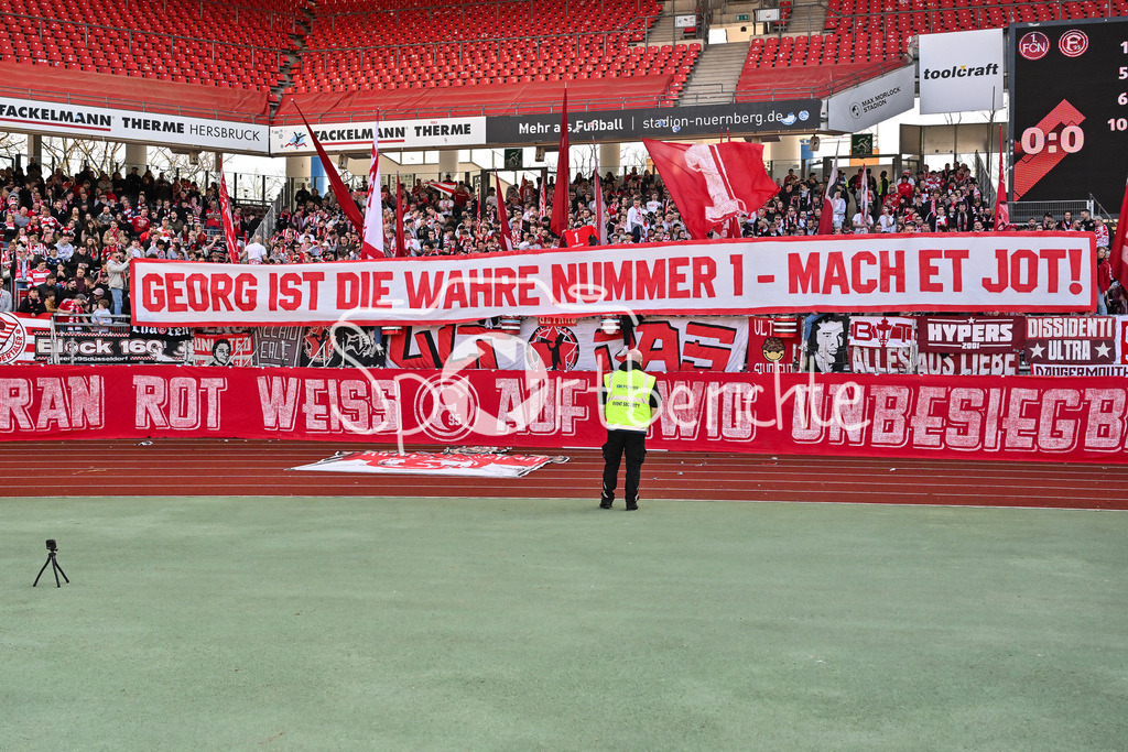 1. FC Nürnberg - Fortuna Düsseldorf | NUREMBERG, GERMANY - 07. MARCH:  die Fans der Gäste machen eine Choreo für den verstorbenen Georg KOCH während dem Match zwischen dem 1. FC Nürnberg und Fortuna Düsseldorf am 25. Spieltag der 2. Bundesliga im Max Morlock Stadion / DFL REGULATIONS PROHIBIT ANY USE OF PHOTOGRAPHS AS IMAGE SEQUENCES AND/OR QUASI-VIDEO