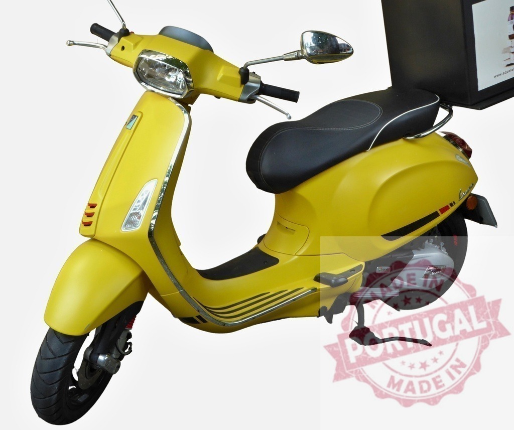 Yellow Vespa Scooter Parked with Delivery Box on White Background | Yellow Vespa scooter parked with delivery box attached, ready for service - Realized with Pictrs.com