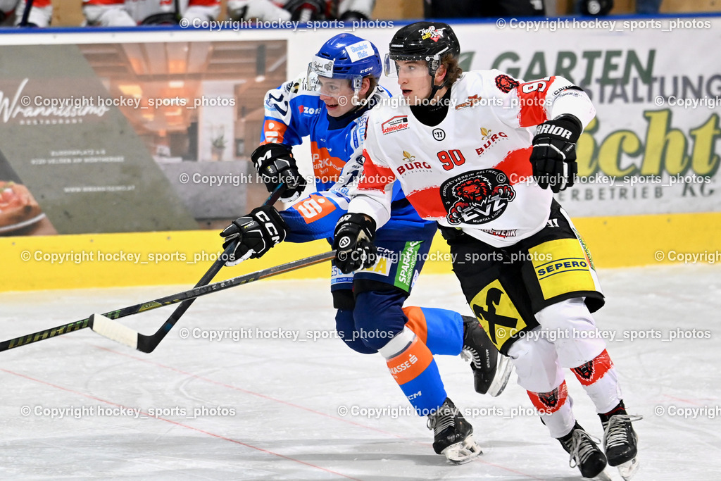 ESC SPARKASSE STEINDORF vs. EV ZELTWEG MURTAL LIONS | #90 Bärnthaler Valentin EV ZELTWEG MURTAL LIONS, #72 Hobitsch Samuel ESC Steindorf, ESC SPARKASSE STEINDORF vs. EV ZELTWEG MURTAL LIONS, ESC SPARKASSE STEINDORF vs. EV ZELTWEG MURTAL LIONS am 27.12.2025 in Steindorf (Ossiachersee Halle), Austria, (Photo by Bernd Stefan)